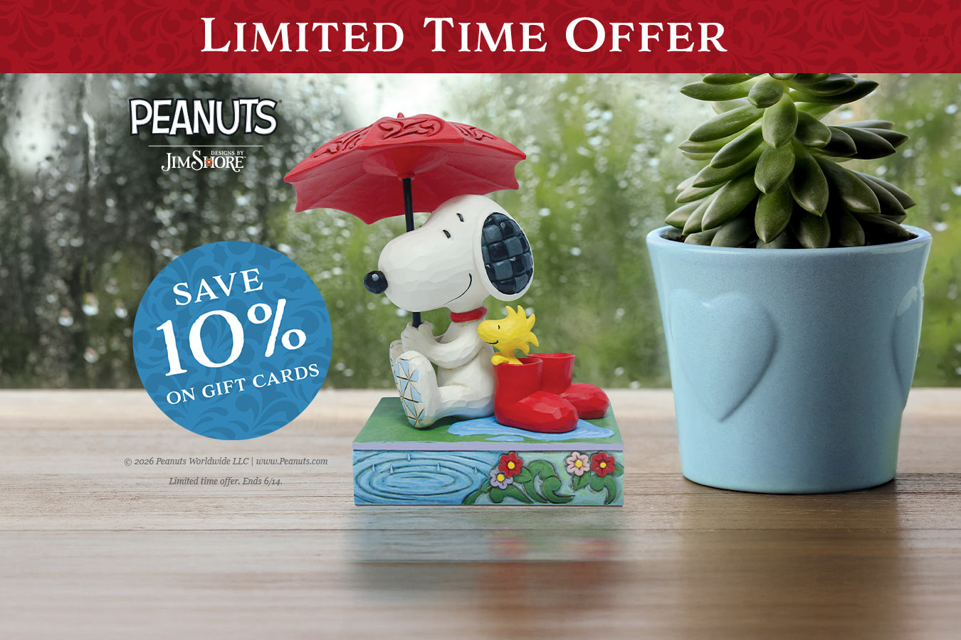 Snoopy figurine with an umbrella and boots next to a potted plant on a wooden surface, with a promotional banner at the top.