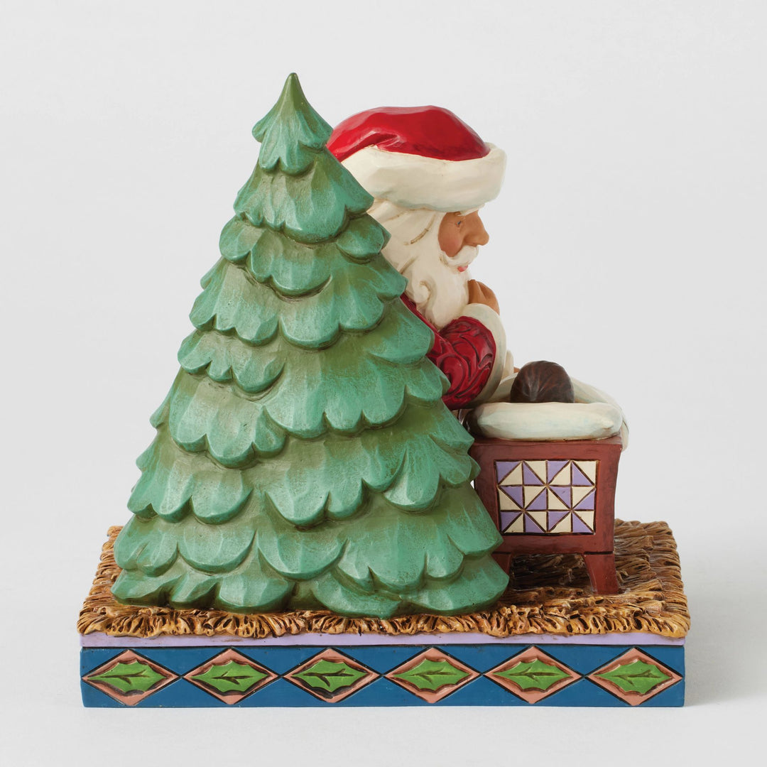 Santa Kneeling over Baby Jesus