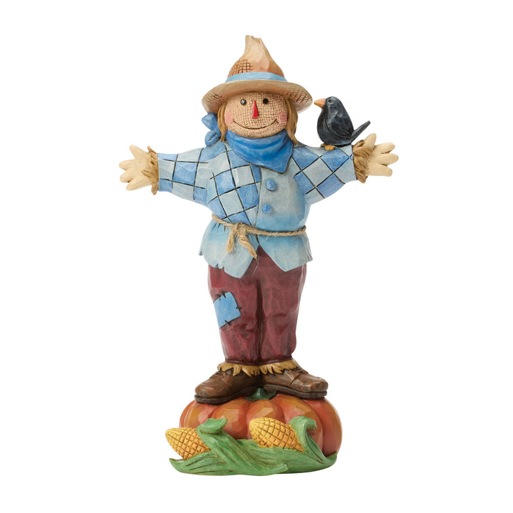 Scarecrow Standing on Pumpkin