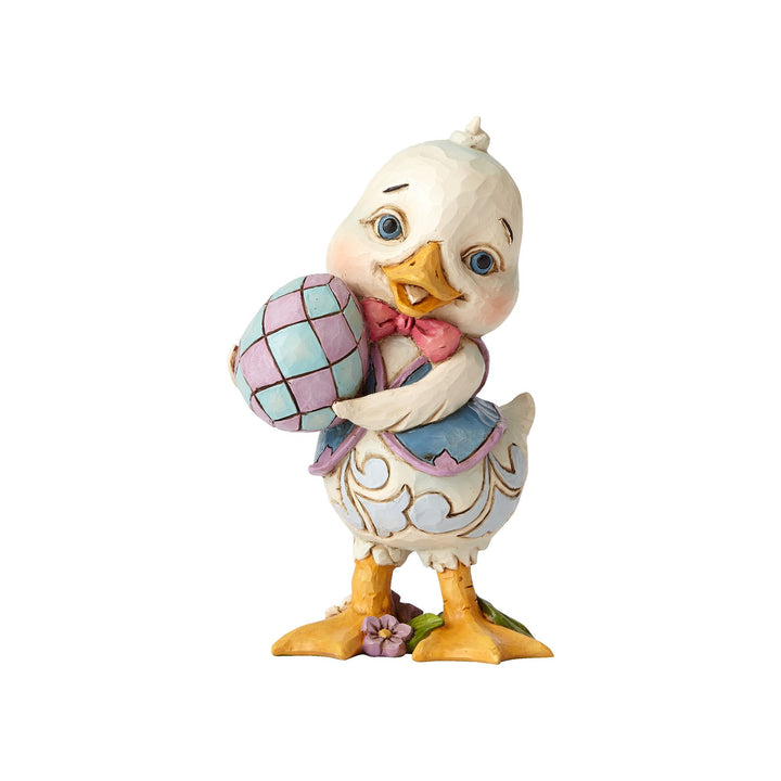 Pint Sized Duck Holding Egg